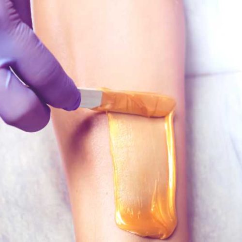 bigstock-Hair-Removal-With-Wax-Shugari-429923981